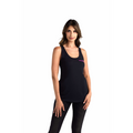 Woman wearing a black sleeveless tank top with small pink text on the chest.