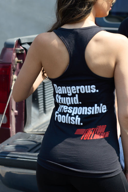 Woman wearing a black tank top with red Adrenaline Vans logo on the chest.