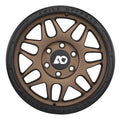 Bronze off-road alloy wheel with multi-spoke design and black outer rim.