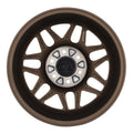 Bronze alloy wheel with multi-spoke design viewed from above