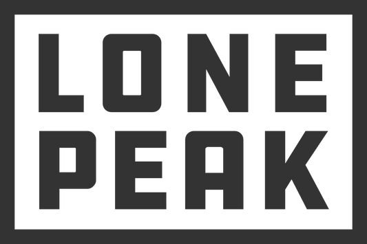 Black rectangular Lone Peak logo in bold block letters on dark background