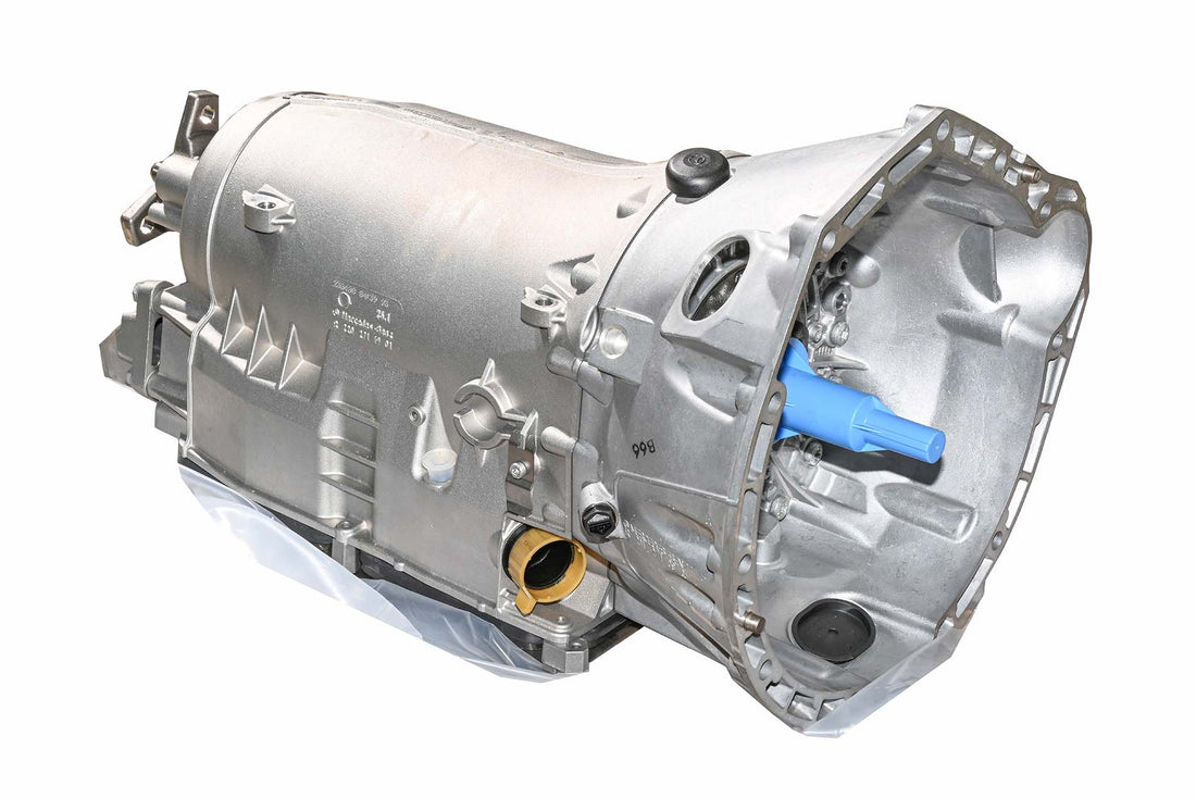 Automatic car transmission system in silver housing on white background