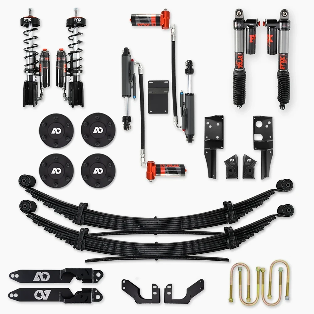 Complete suspension lift kit with shocks, leaf springs, and mounting hardware for off-road vehicles
