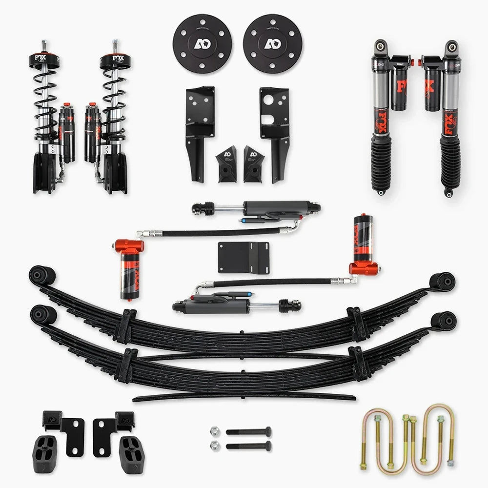 Complete suspension lift kit with shocks, leaf springs, and mounting hardware for off-road vehicles