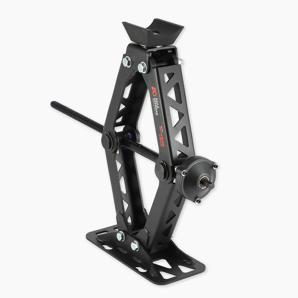 Heavy duty scissor jack by Agile Offroad lifting a vehicle — trail-rated 7000 lb jack with drill-operated design for off-road repairs